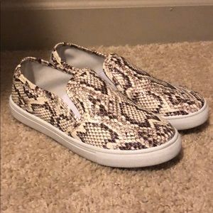 Snake print slip on sneakers
